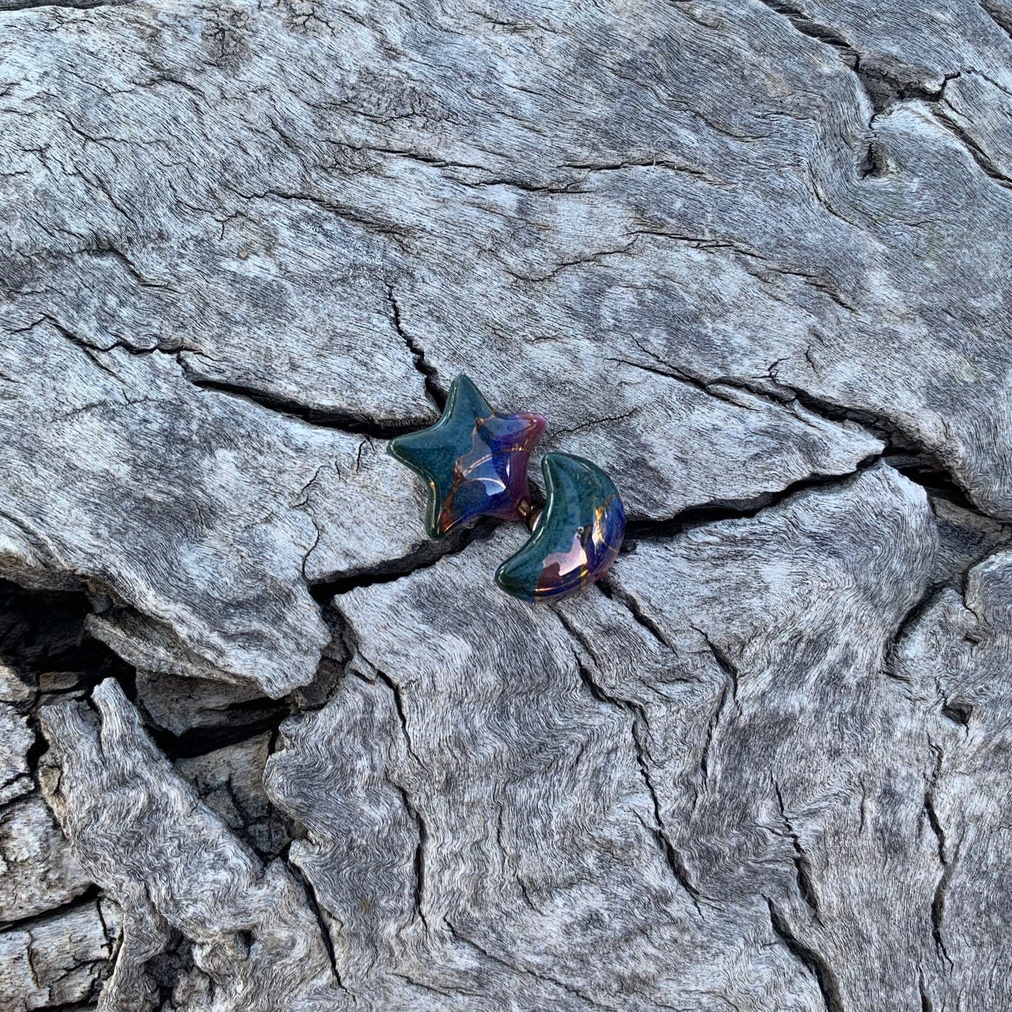 Multicolored butterfly on a textured gray rock surface